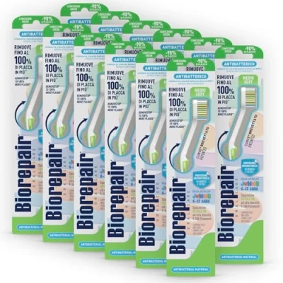 Imagen de Biorepair, cepillo de dientes Junior, paquete 12 unidades, para niños 6 a años, clínicamente probado, con cerdas medio suaves, forma curva patentada, antibacteriano,