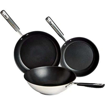 Imagen de Amazon Basics Juego de Utensilios Cocina Inducción Sartenes y Wok, Antiadherentes, Acero Inoxidable, 24/28/28 cm, 3 Unidad, Plata