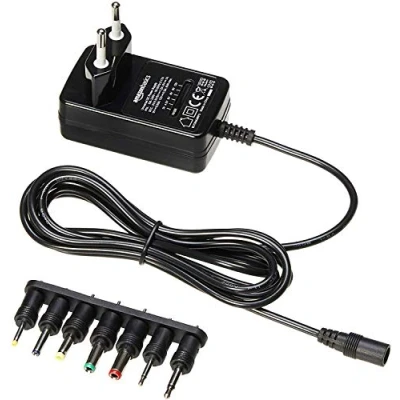 Imagen de Amazon Basics Adaptador de Fuente alimentación CC, Universal, con 7 Conectores Intercambiables, 3 12 V, polaridad Reversible, Extra Grande, Negro