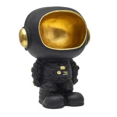 Imagen de HOME DECO FACTORY, HD0160 Estatua Negra del Astronauta con Bolsillo vacío, Objeto Decorativo Moderno y práctico, diseño futurista, Ideal para salón u Oficina, 20 cm, Color Negro Dorado