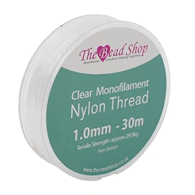 Imagen de The Bead Shop hilo invisible de nailon transparente 1 mm, coser transparente, decoración colgante, no elástico, resistencia a la tracción aproximada 29 kg (carrete mm 30 m)