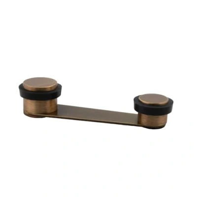 Imagen de Tope de Puerta Retenedor Giratorio Fijación Adhesiva o con Tornillo+Taco Para Hasta 50 mm Grosor Laton EVI Herrajes (Laton Cuero Envejecido Goma Negra)