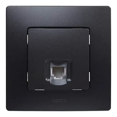 Imagen de Legrand 396493 Toma para teléfono RJ11 de la gama Niloé monoblock, mecanismo completo, color negro