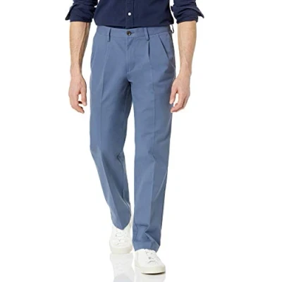 Imagen de Amazon Essentials Pantalón Chino Plisado, Resistente a Las Arrugas y de Corte clásico (Disponible en Tallas Grandes Largos Especiales) Hombre, Añil, 42W / 32L