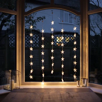 Imagen de Lights4fun Cortina de 40 Estrellas iluminadas por LED Blanco con Cable Transparente