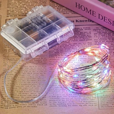 Imagen de Ariceleo Guirnalda de Luces LED 20m, 1 Paquete 200 Hadas a Pilas, Alambre Cobre Multicolor con Remoto, Temporizador &amp; Modo Centelleante, Ideal para Exterior Dormitorio Bodas Navidad