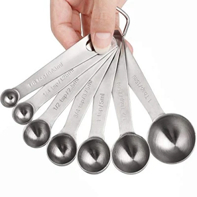Imagen de Juego de 7 cucharas medidoras acero inoxidable para medir ingredientes secos y líquidos