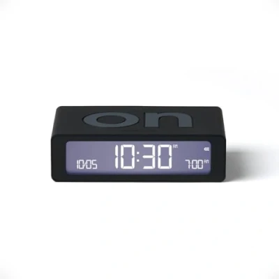 Imagen de Lexon Flip Mini despertador de Viaje Digital LED con Función On/Off, brillo ajustable, recargable y sensible al tacto, ideal como mesita noche, color negro
