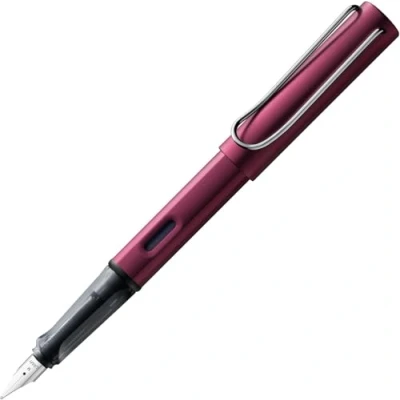 Imagen de Lamy AL star black purple Pluma estilográfica con empuñadura ergonómica y plumín de acero pulido en tamaño F cuerpo aluminio ligero incluye cartucho T 10 azul Diestro