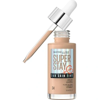 Imagen de Maybelline New York,Base de maquillaje enriquecida con Vitamina C, Hasta 24H, Acabado luminoso, Superstay Skin Tint, Tono 34