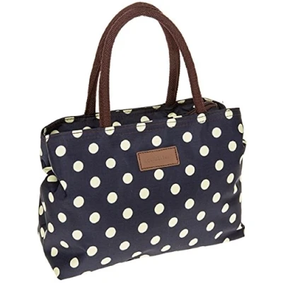 Imagen de Joe Davies Equilibrium Bolso impermeable con lunares azul marino y crema