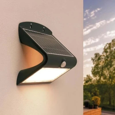 Imagen de Ledvion Aplique Solar con Sensor de movimiento Moderno, Negro, 8W, 3000K, IP65 resistente al agua y 220 lúmenes, detección e interruptor crepuscular, eficiencia energética