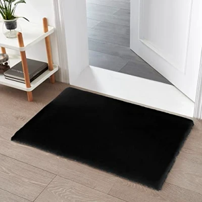 Imagen de Teppich Wölkchen Alfombra de imitación Piel Sala Estar, decoración la Dormir Lavable como Cama, cojín Silla Negro, 60 x 90 cm