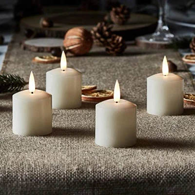 Imagen de Lights4fun TruGlow® Conjunto de 4 Velas Votivas LED a Pilas en Cera Blanca con Mecha y Llama Realista