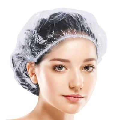 Imagen de Kryzulax 50 Piezas Gorros de Ducha Desechable,Gorros Impermeable,Gorros Plastico Transparente,Gorros Desechables Estetica,para uso en el hogar,hotel,Spa y peluquería(42cm)