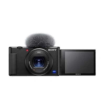 Imagen de Sony ZV 1 Cámara compacta Premium ZV1AB.CE3 Cargador Incluido (Sensor de Tipo 1,0, Lente F1.8 2.8 24 a 70 mm, vídeo 4K, Enfoque automático Ojos, Pantalla inclinable, para Fotos y vídeos)