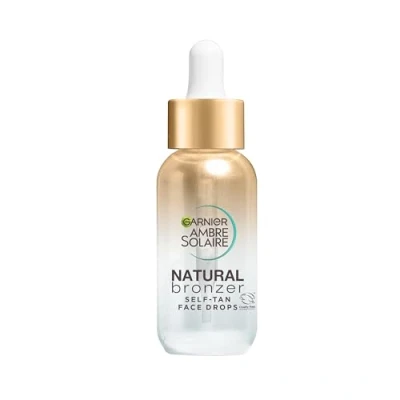 Imagen de Garnier Ambre Solaire Bronceador natural, gotas autobronceadoras para la cara, ácido hialurónico y agua de coco, brillo hecho a medida, bronceado falso gradual aprobado por Cruelty Free
