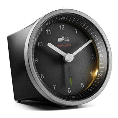 Imagen de Braun Reloj Despertador analógico controlado por Radio Zona con Hora Central Europea (DCF/GMT+1), repetición e iluminación, Alarma pitido en Crescendo Negro y Plata, BC07SB DCF