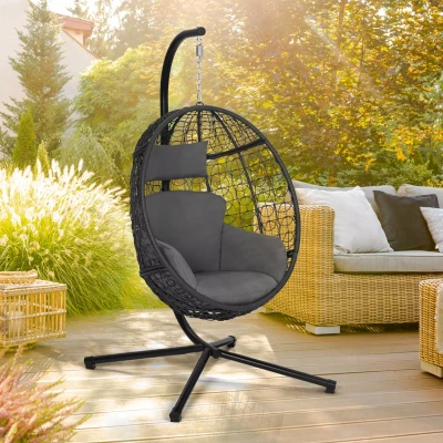 Imagen de Sillón gris calado en forma de huevo con cojín