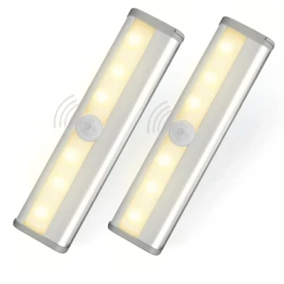 Imagen de 2x Luz Armario 6 LED con Sensor de Movimiento, Banda Magnética, Funciona Pilas (No incluidas). Barra Nocturna Cálida 10 CM Multiusos Armario, Cocina, Pasillo, Baño, Escalera.