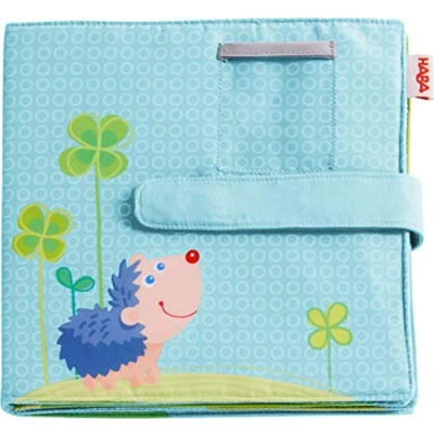 Imagen de HABA 305258 Álbum de fotos bebé la suerte, álbum tela con 10 páginas, bolsillos para 8 en formato x 15 cm, a partir 12 meses