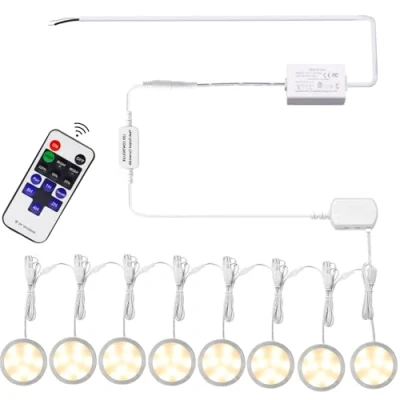 Imagen de AIBOO iluminación LED enlazable para debajo del gabinete, luces regulables de disco 12 V, cableadas con control remoto RF inalámbrico estado ánimo cocina (8 luces, blanco