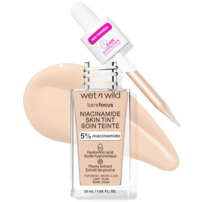 Imagen de Wet n Wild Bare Focus Niacinamide Skin Tint, Base de Maquillaje Cobertura Modulable, Fórmula Ligera Enriquecida con Ácido Hialurónico y Vitamina E para un Look Radiante, Fair Beige