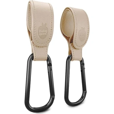 Imagen de Baby Uma Ganchos Carro Bebé de Cuero Sintético (Pack 2) Accesorios Bebé, Hasta 5 kg, Ajuste Universal, Antideslizante (Beige)
