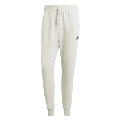 Imagen de adidas Essentials Fleece Regular Tapered Pants Pantalones, Shadow Brown, XL Tall Hombre