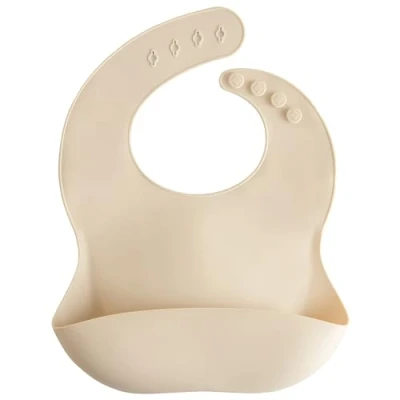 Imagen de mushie Babero de Silicona para Bebés Baberos Alimentación con Bolsillo Fáciles Lavar 4 Tamaños Ajustables Sin BPA Accesorio Durable Niños Pequeños y Niñas Shifting Sand