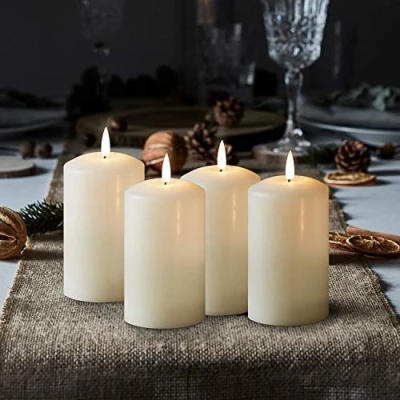 Imagen de Lights4fun TruGlow™ Juego de 4 velas LED sin llama con batería mediana para decoración corona Adviento, 12,5 cm, cera marfil real