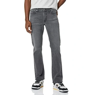 Imagen de Amazon Essentials Vaqueros Acampanados de Corte Ajustado Hombre, Gris Efecto Lavado, 32W / 29L