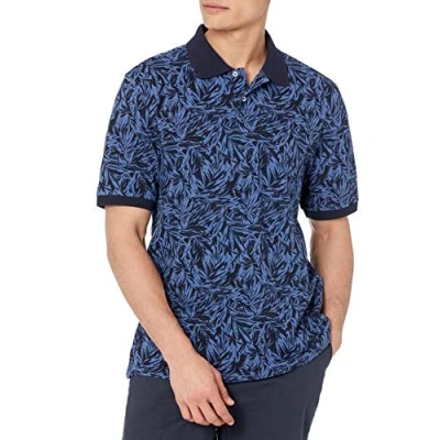 Imagen de Amazon Essentials Polo en piqué de algodón con Corte Regular (Disponible Talla Grandes y Largos Especiales) Hombre, Añil Estampado Hojas Palmera, S