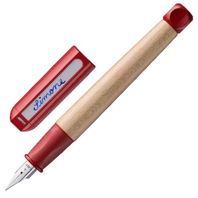 Imagen de Lamy abc red pluma estilográfica para niños y principiantes con empuñadura ergonómica plumín de acero pulido en tamaño A robusta madera arce cartucho tinta azul T 10 Diestro