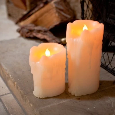 Imagen de Lights4fun Juego de 4 velas LED cera con gotas temporizador, funcionamiento a pilas, decoración para salón