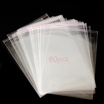 Imagen de 90 Bolsas de Celofán Transparente Autoadhesivas. Plástico OPP Medianas con Costura Sellada y Orificio Ventilación para Chuches, Regalos, Joyas, Tarjetas, Dulces, Bombones, Fotos.