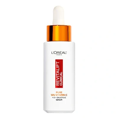Imagen de L&#039;Oreal Paris L&#039;Oréal Revitalift Clinical 12% Pure Vitamin C Brightening Serum para rostro, potente protección antioxidante, piel más brillante y suave, incluye ácido hialurónico, salicíli