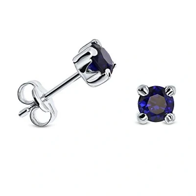Imagen de Miore pendientes de presion con 4 garras para mujer en oro blanco 9 kt 375 zafiro azul