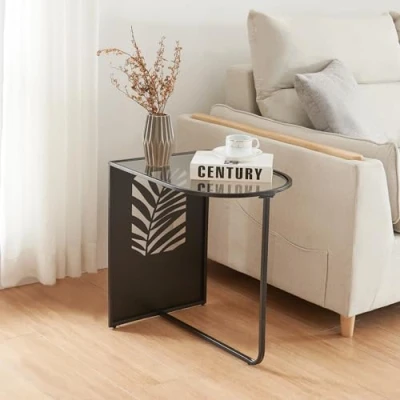 Imagen de [en.casa] Mesa Auxiliar Semiovalada Mesilla de Noche con Motivo Hoja Palma Entrada Estable Multiusos para Salón Dormitorio Recibidor Metal Cristal 50 x 35 cm Negro