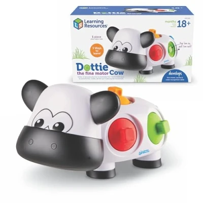 Imagen de Learning Resources Dottie, la vaca para practicar motricidad fina , juguete niños pequeños, animal de granja sensorial y calmante fina, 18 + meses