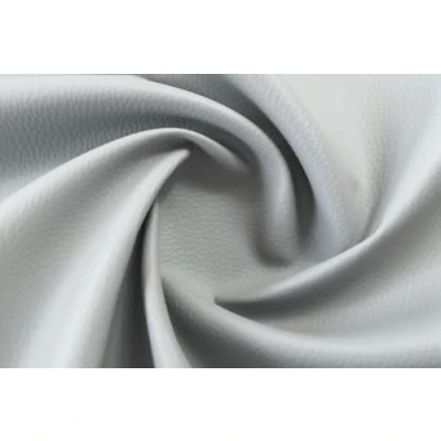 Imagen de Tela de Polipiel para Tapizar 140CM Ancho. Piel Sintética Suave Muebles, Hogar, Accesorios, Manualidades, Confección, Cuero Sintético.100% España. (Gris Claro, 3 Metros)