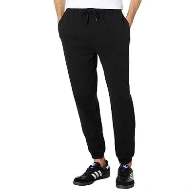 Imagen de Hurley OAO Jogger de Forro Polar sólido Pantalones, Negro, L para Hombre