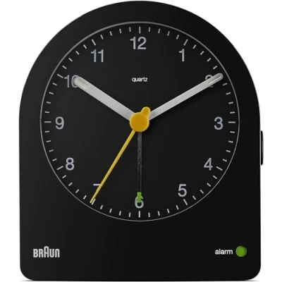 Imagen de Braun Classic Analogue Alarm Clock with Snooze and Continuous Backlight, Quiet Quartz Movement, Crescendo Beep in Black, Model BC22B.