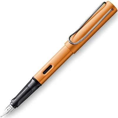 Imagen de Lamy 1233452 AL star 27 Pluma estilográfica de aluminio en color bronce con mango transparente y punta acero plumín F
