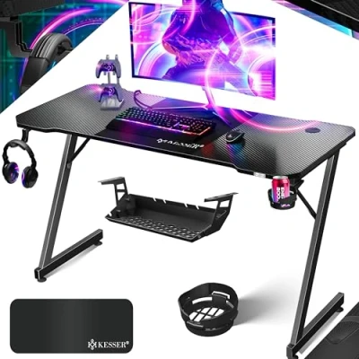 Imagen de KESSER® Mesa Gaming 140 x 60 cm Escritorio para Gamer en Forma de Z Soporte Auriculares ergonómica Ordenador Incl. Alfombrilla ratón y