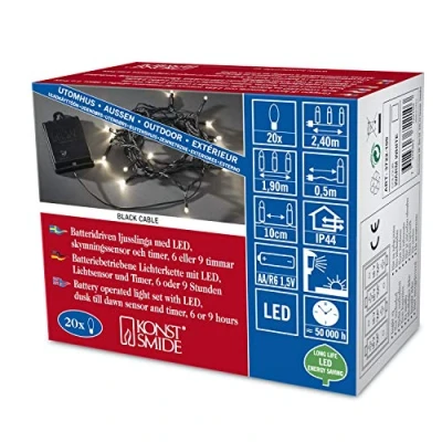 Imagen de Konstsmide 3722 100 luces LED para exteriores (IP44), funciona con 4 pilas AA de 1,5 V (no incluidas), sensor luz, temporizador 6 horas y 9 horas, 20 diodos blancos cálidos, cable negro