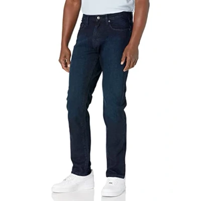 Imagen de Amazon Essentials Pantalón Vaquero Elástico de Ajuste Deportivo Hombre, Azul sobre Teñido, 28W / 32L