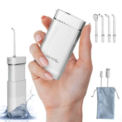 Imagen de Aquapik® Mini Irrigador Dental Portátil Elimina la Placa + Recomendado por dentistas Cuida tus Implantes y Ortodoncia 4 Boquillas 3 Modos de Uso Recargable USB C Ideal para Viaje Oficina