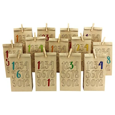 Imagen de Papierdrachen Calendario de Adviento para hacer en casa, juego papel kraft con 24 bolsas marrón impresas, forma casas colorear y llenar, números colorear, Navidad