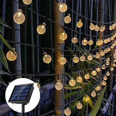Imagen de EXTRASTAR Guirnalda Luces Exterior Solares, 30 LED, Luz Cálida 2200K, 10M Cadena De Impermeable, 8 Modos Iluminación para Jardín, Boda, Vacaciones, Navidad, Terraza, Fiestas